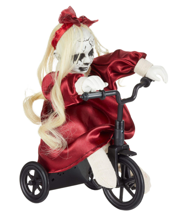 Haunted Doll on Tricycle doll Riding